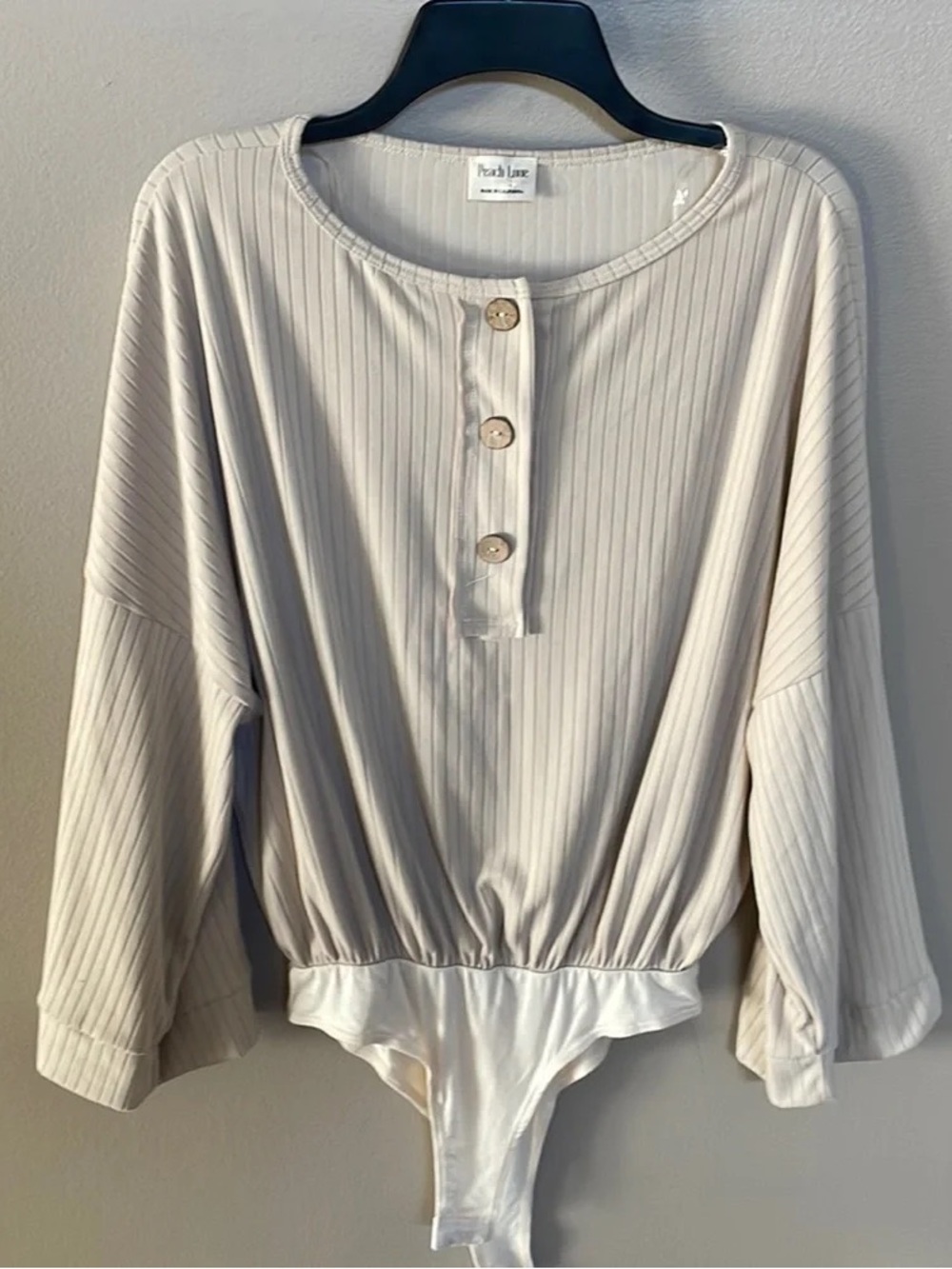 Peach Love California Cream Ribbed Button-Front Long-Sleeve Bodysuit